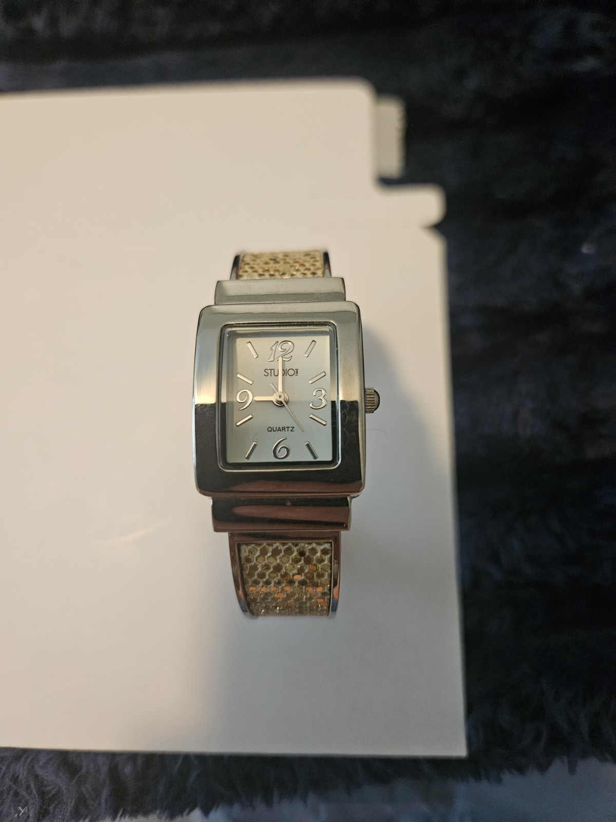 Studio Time Quartz Watch Featuring Rectangular Case and Gold-Tone Handcuff Band
