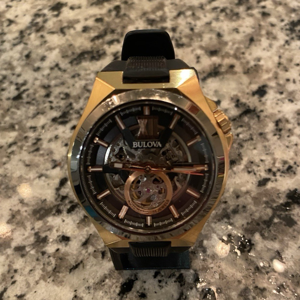 Bulova Sutton Skeleton Dial Automatic Men’s Watch Black Rubber Strap Gold Case