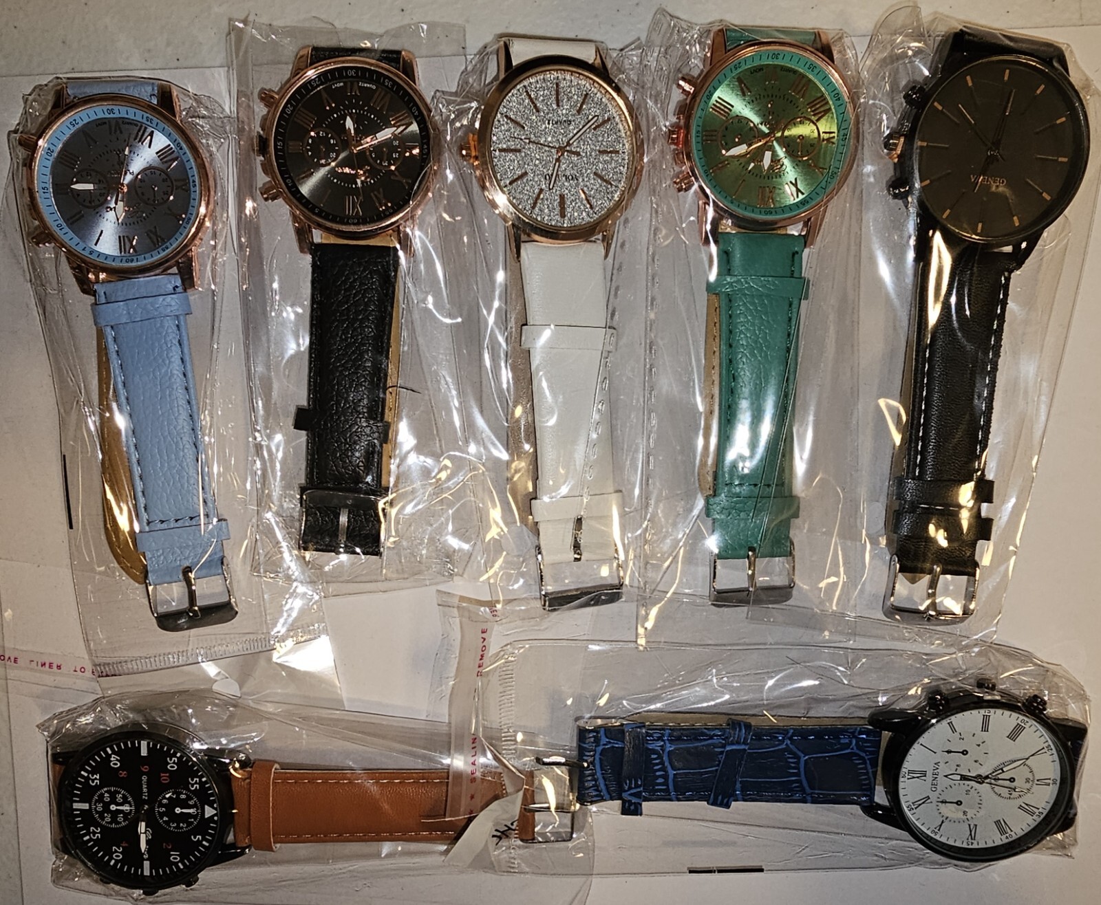 Lot of 7 Mens Womens Watches Blue Black White Green Tan #27