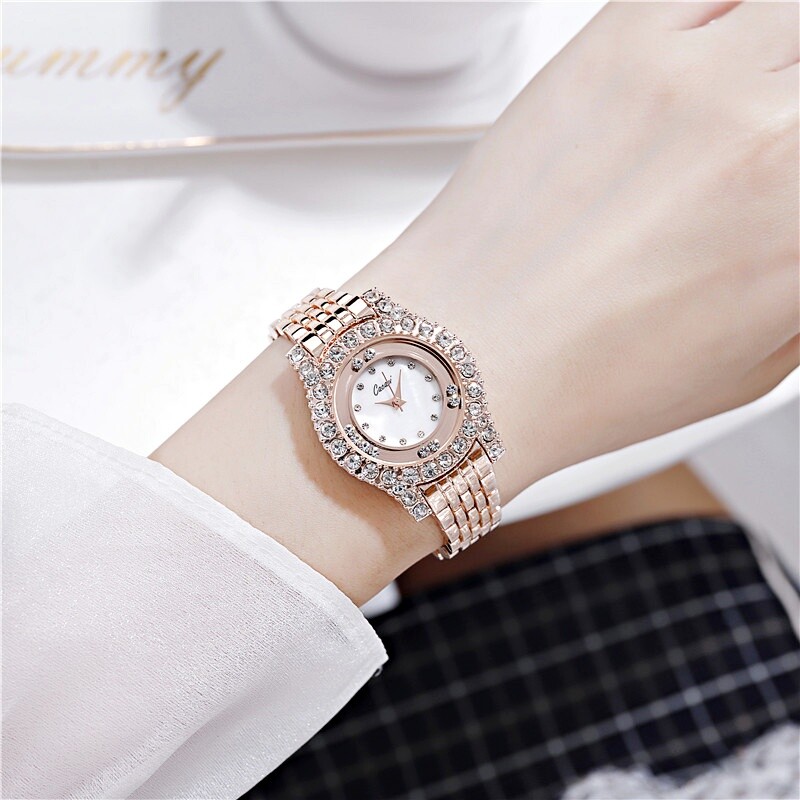 Womens Luxury Round Face Moving Crystal Casual Dress Formal Shiny Quartz Watches