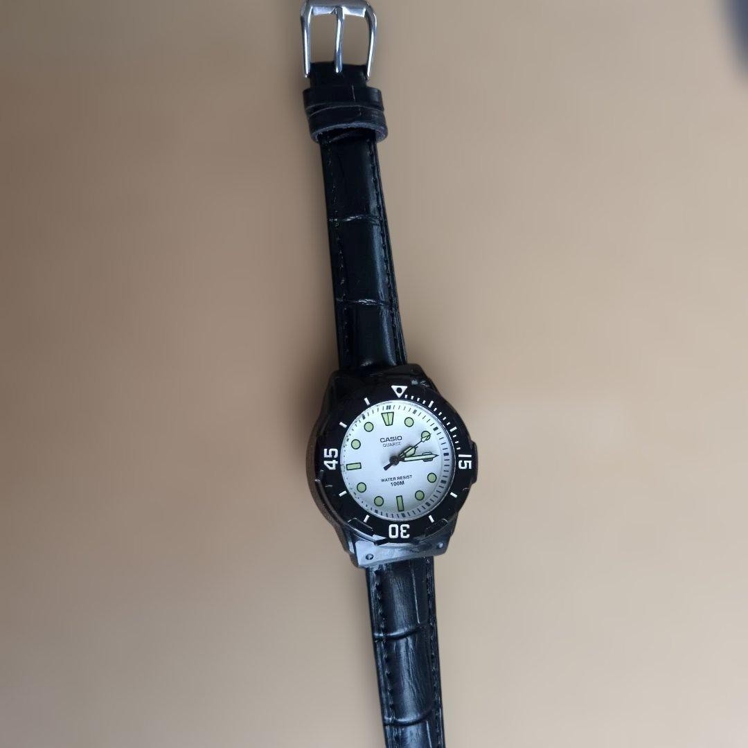 Working condition. CASIO quartz wristwatch, white dial.