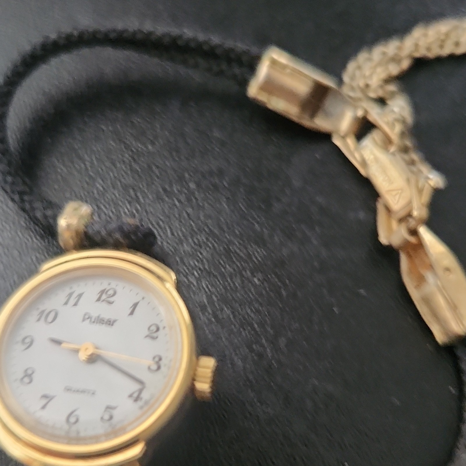 Pulsar Women’s Vintage Quartz Analog Gold Tone White Dial Black Cord Strap
