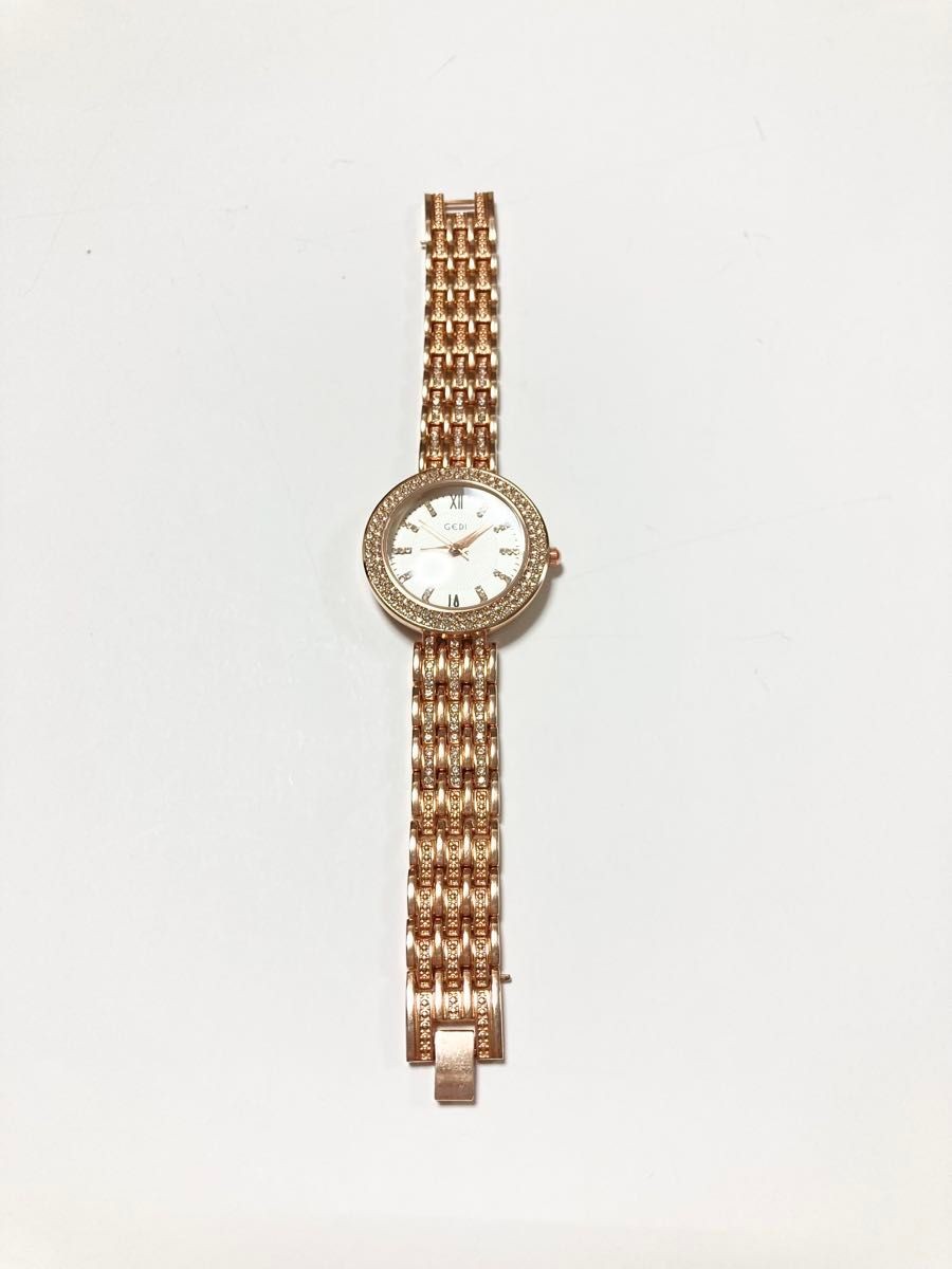 GEDI Ladies Rose Gold Rhinestone Bezel Bracelet Watch Oval Case Quartz