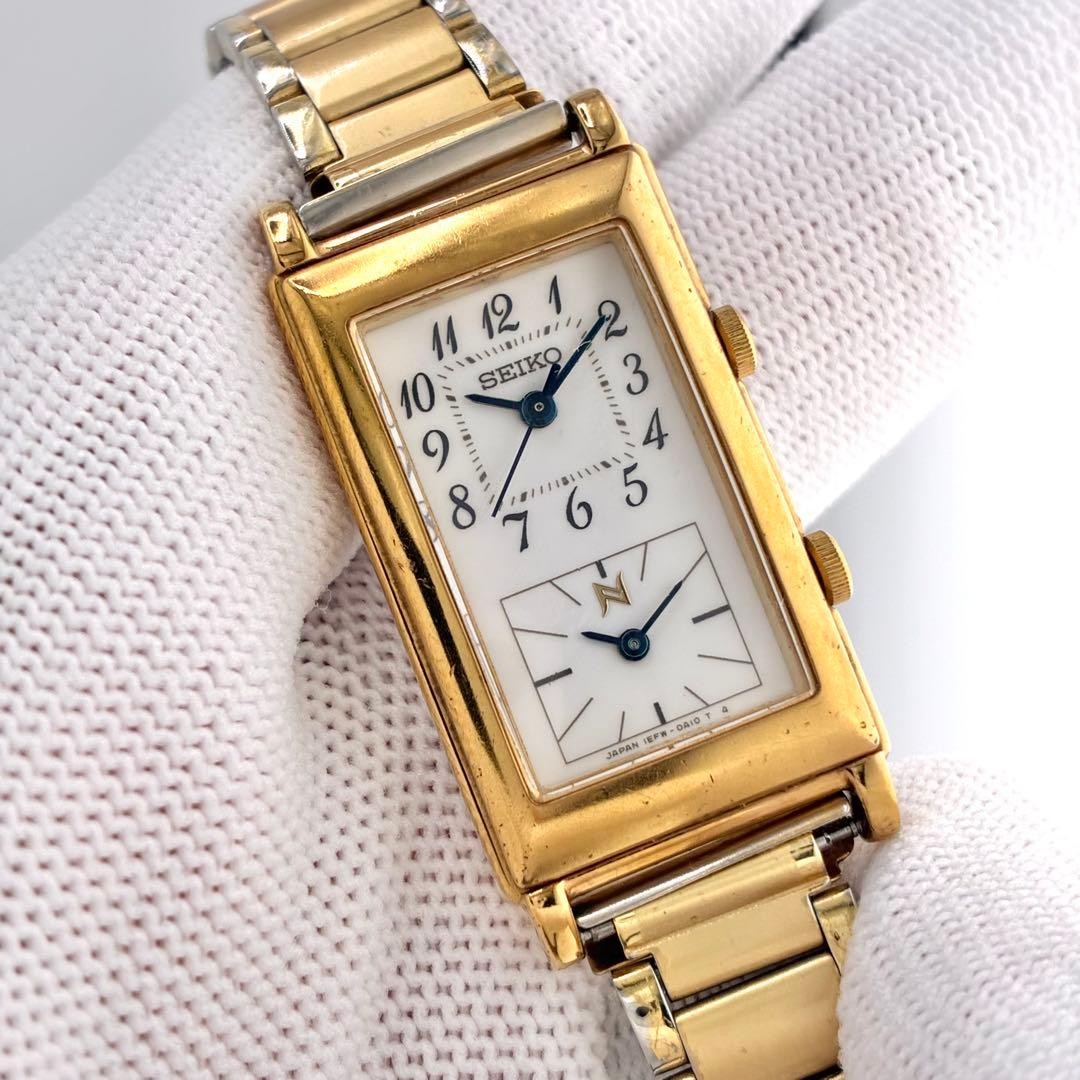 Seiko Ladies Wristwatch Neue Dual Time Blue Hands White Japan 073740