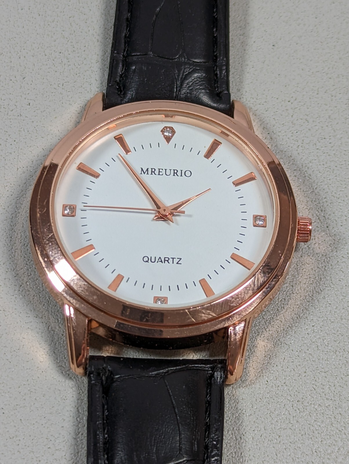 Mreurio White Dial Round Gold Tone Case Black Faux Leather Band Watch