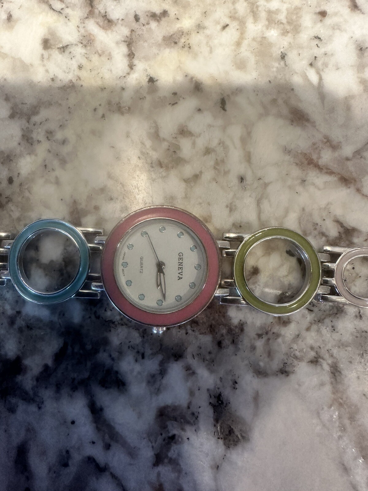 Geneva ladies watch silver tone with pink blue yellow green needs battery