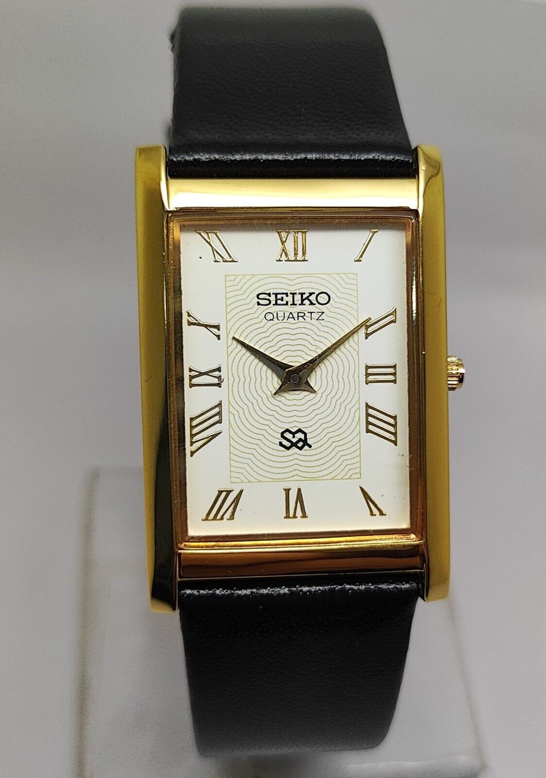 Vintage Seiko Slim Quartz White Face Rectangle Japanese 26MM Case Mens Watch S04