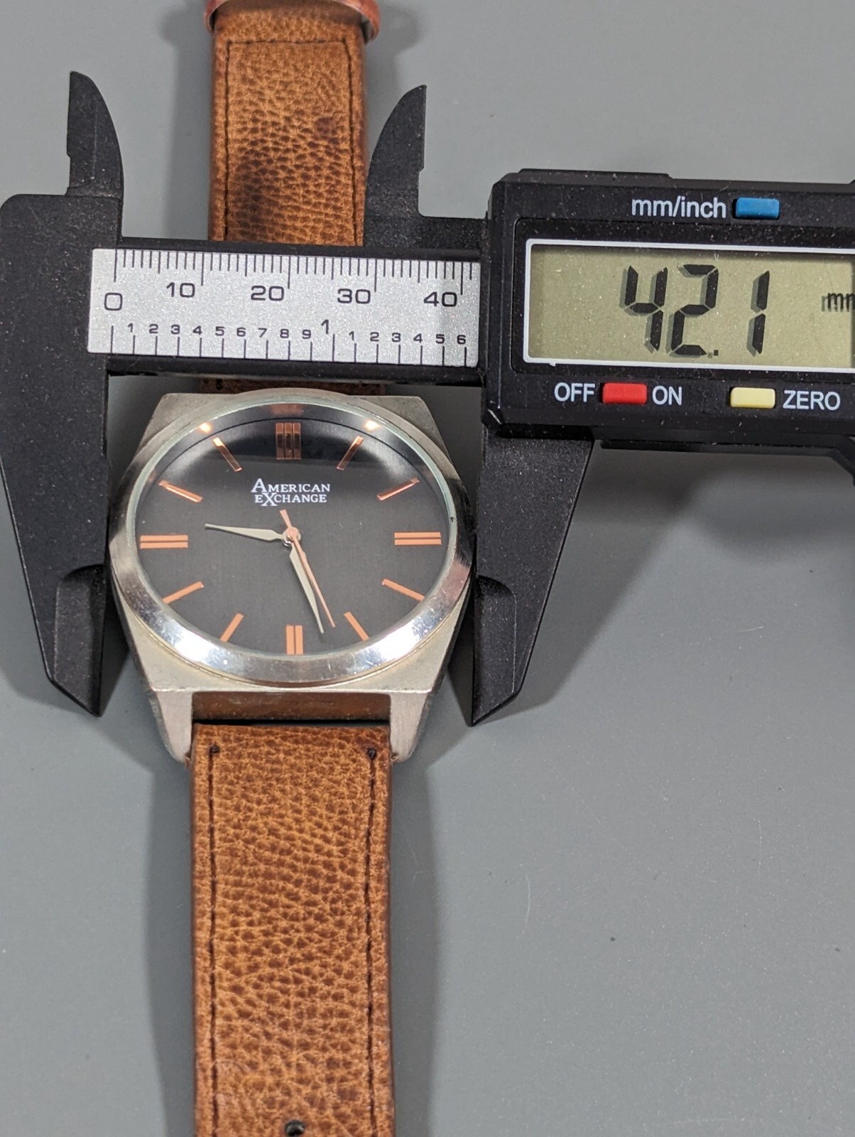 American Exchange Black Dial Round Silver Tone Case Brown Faux Leather Bnd Watch