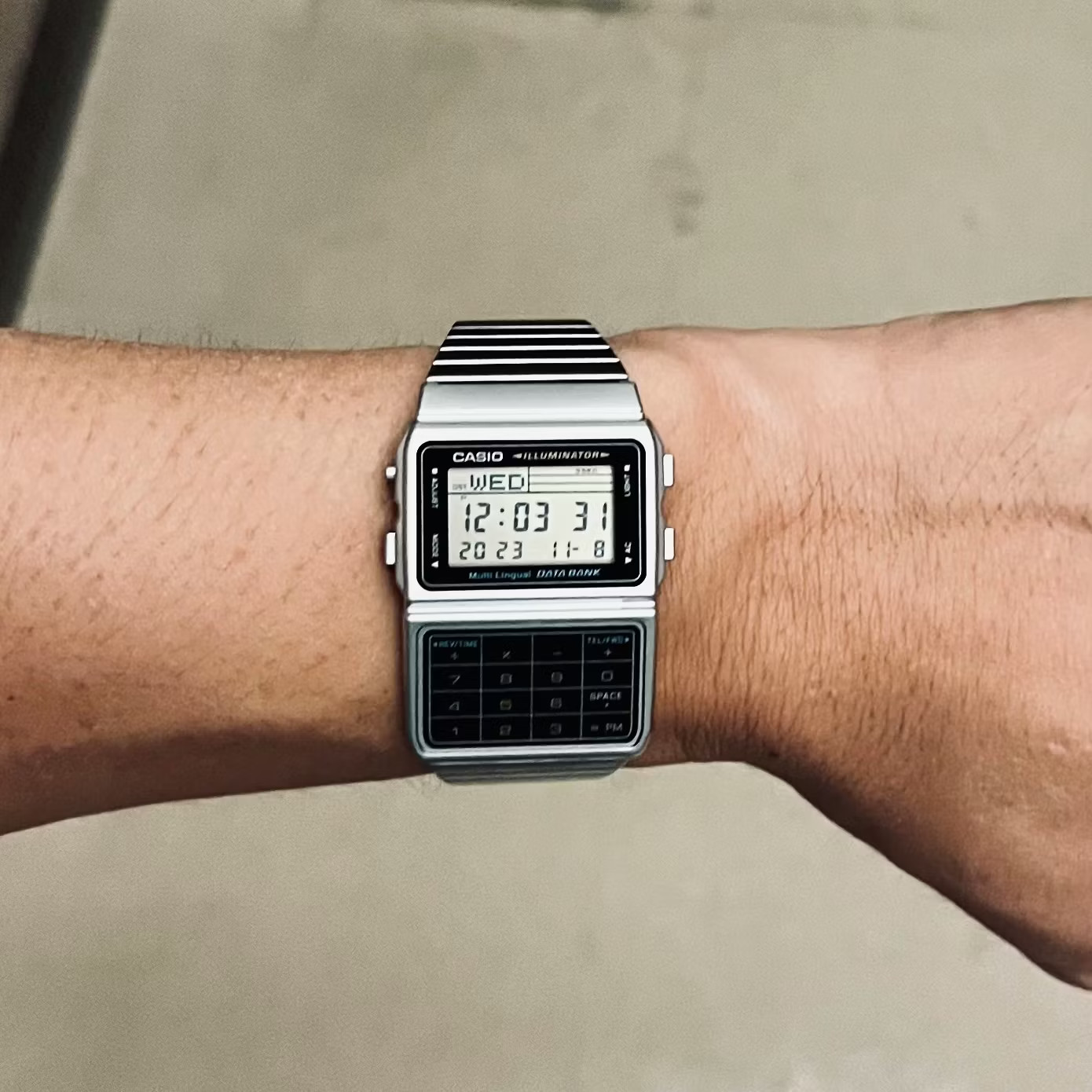 Casio DBC-611-1 Databank Calculator Alarm Telememo Stopwatch Stainless Steel