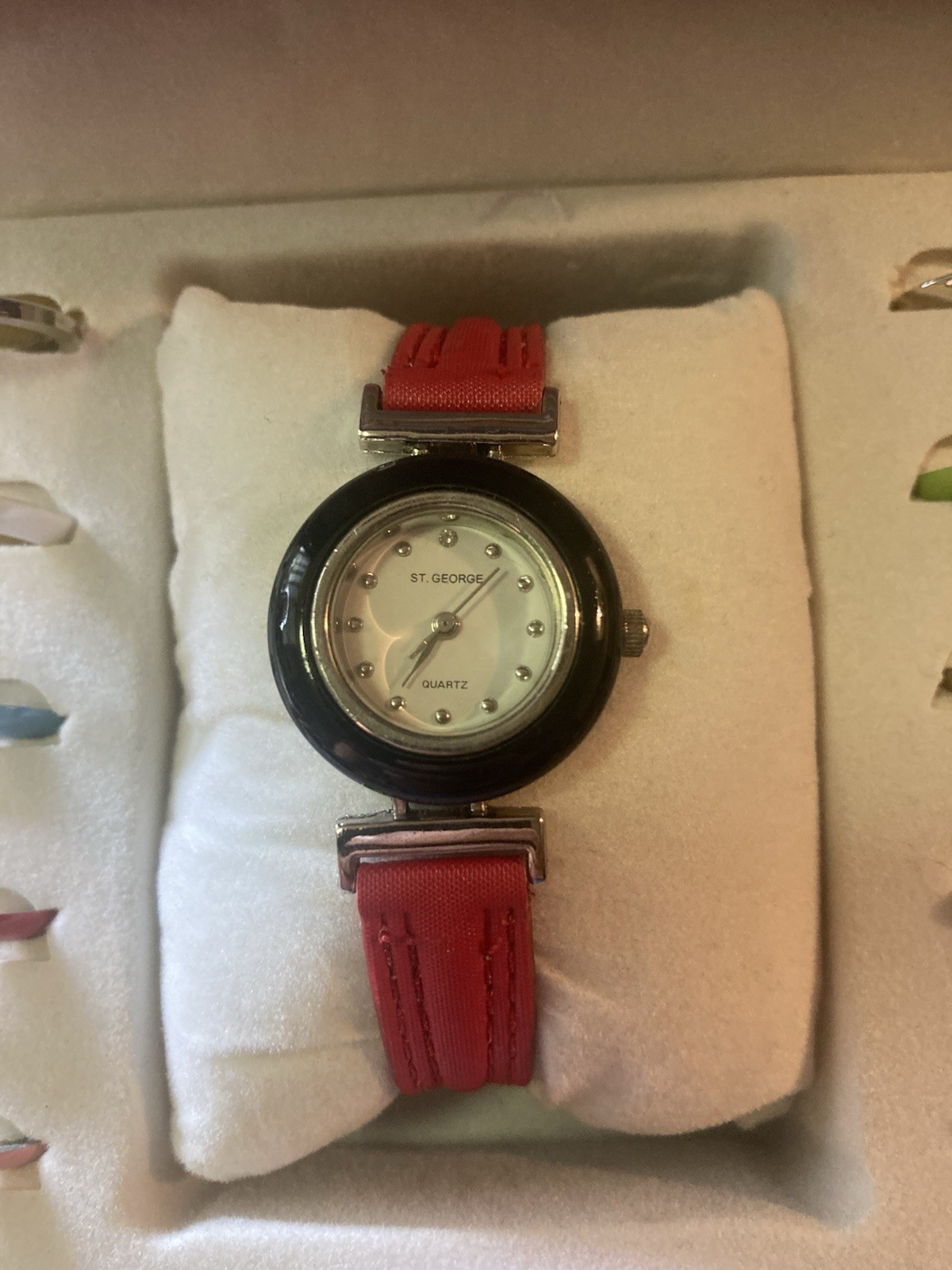 This is a St George watch set with interchangeable bands and bezels