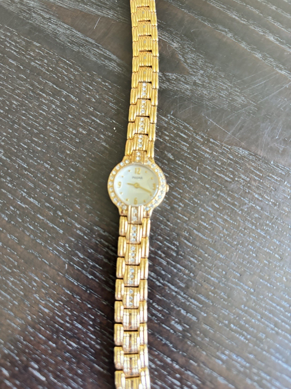 Pulsar Women’s Quartz Dress Watch White Dial Arabic Numerals Diamond Bezel