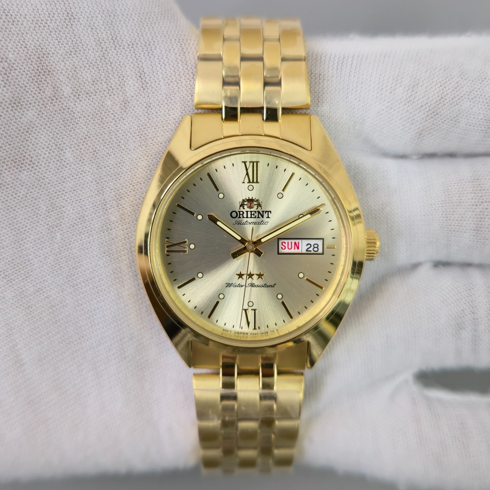 Orient TriStar Rare RA-AB0E13G1BD Automatic Gold Tone Champagne Dial Mens Watch