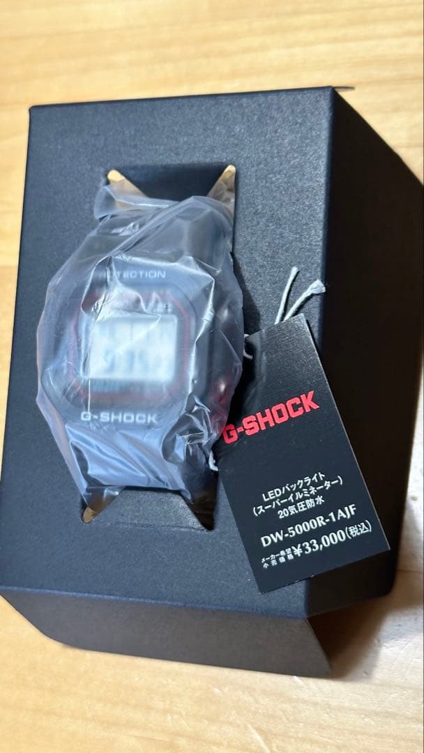 G-SHOCK DW-5000R-1AJF CASIO, with tags, warranty card unfilled.