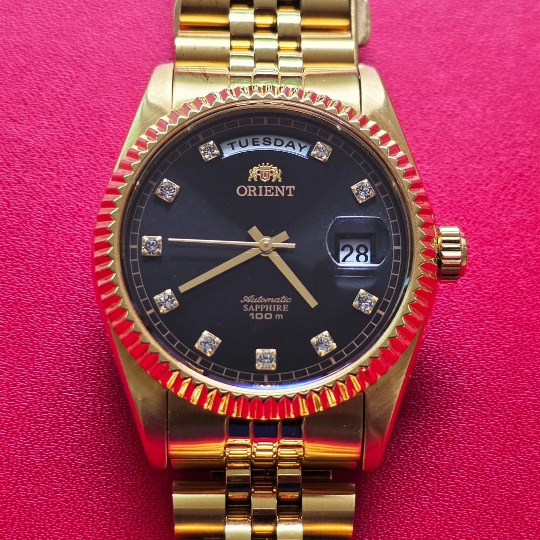 MEN’S ORIENT PRESIDENT 10 POINTS BLACK DIAL AUTOMATIC DAY DATE GOLD/SS