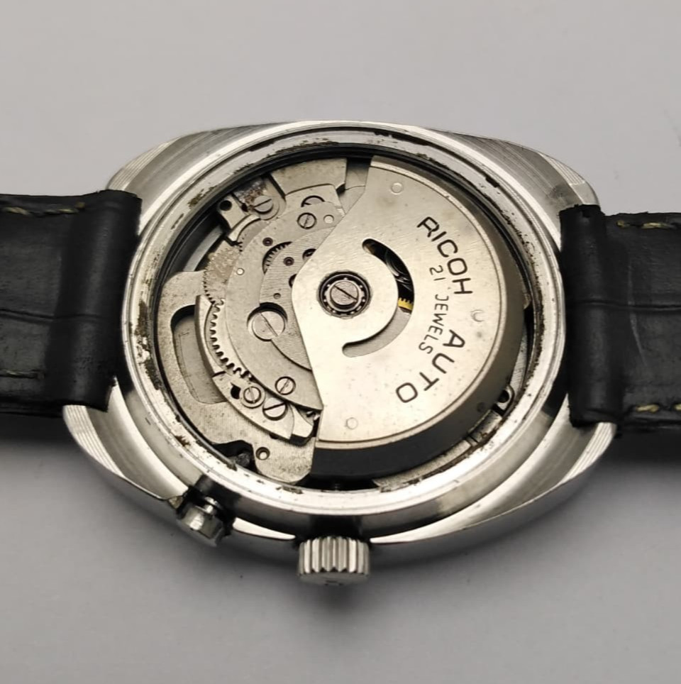 Ricoh Automatic 75003AC Oval Day/Date Sunburst Dial Japan Vintage Men’s Watch