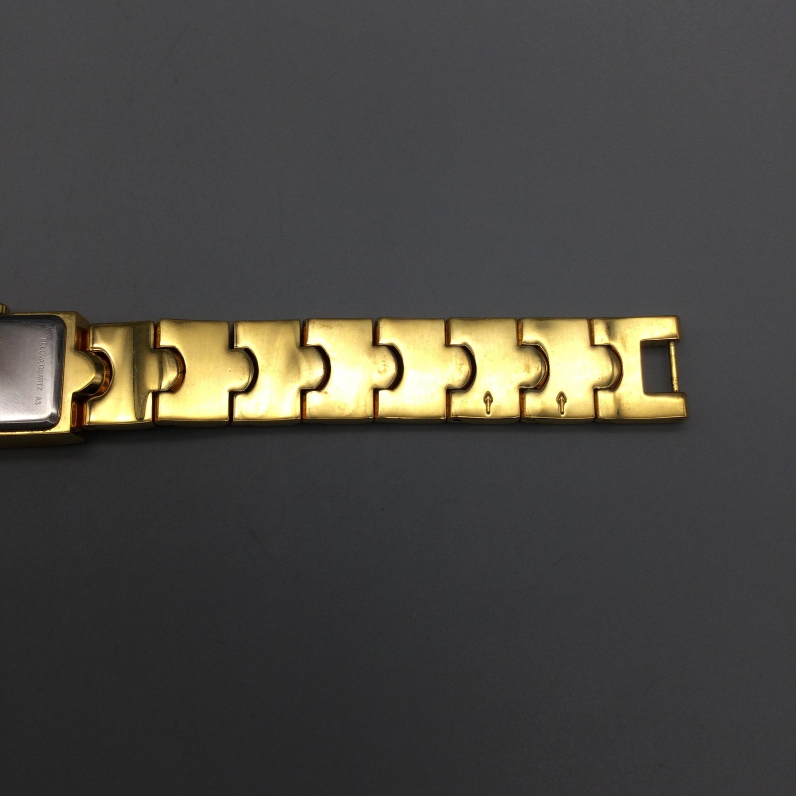 Caravelle By Bulova Womens Watch 17mm Gold Tone Tank Diamond New Battery 6″