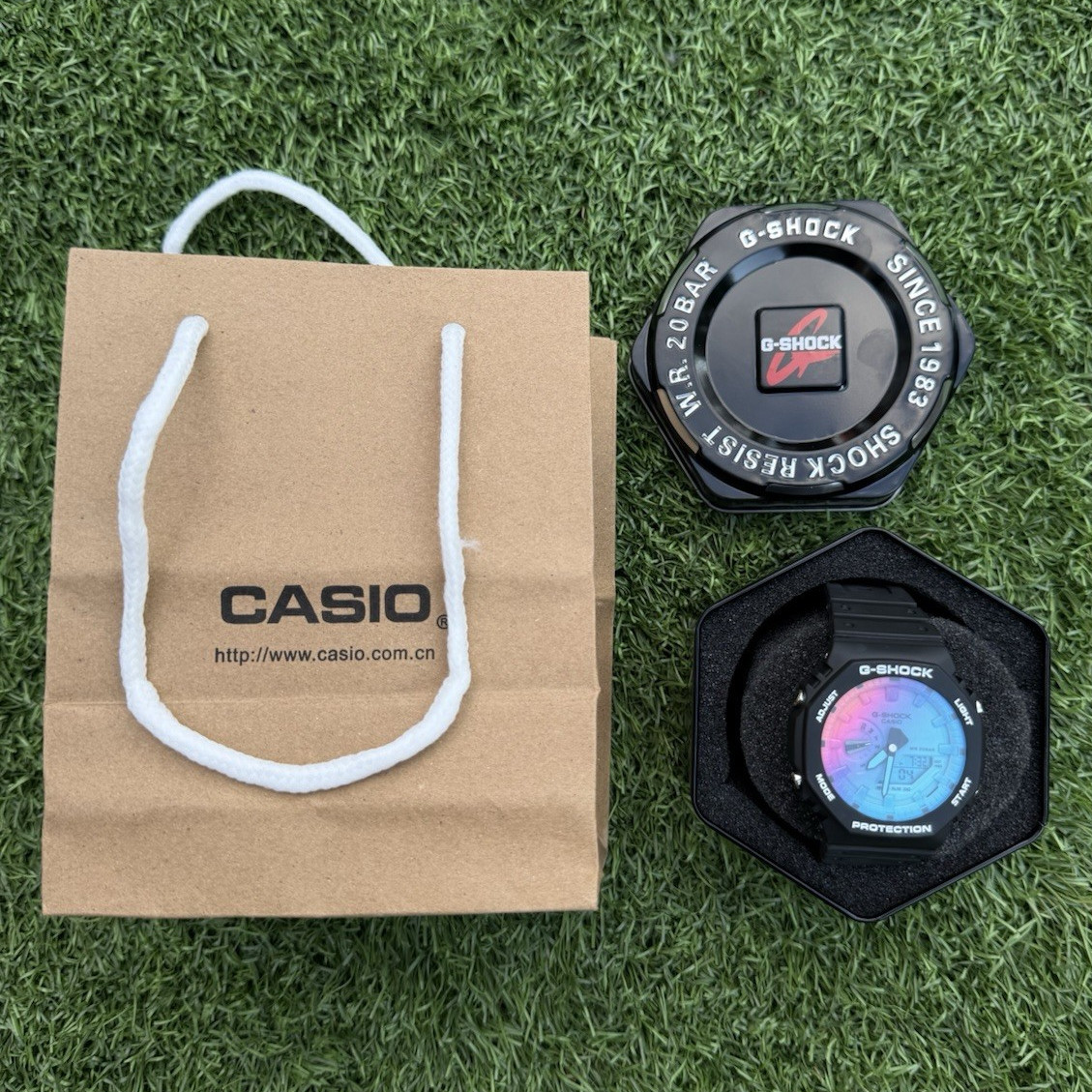 Casio G-SHOCK Analog/Digital 200m Black Resin Octagon Watch Multicolor Dial Tin