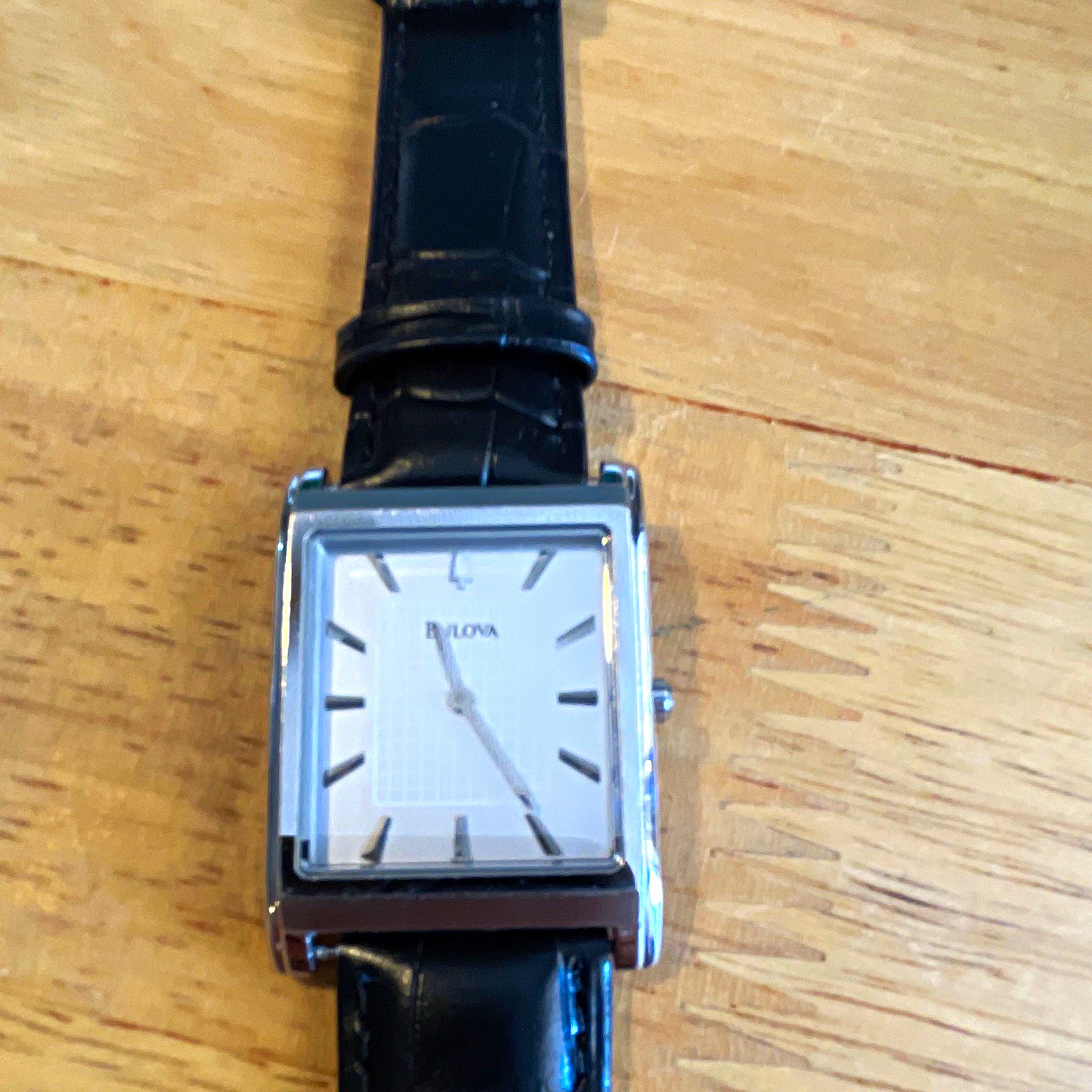 Bulova Quartz Analog Watch 28mm Silver Textured Dial Black Leather Strap WR