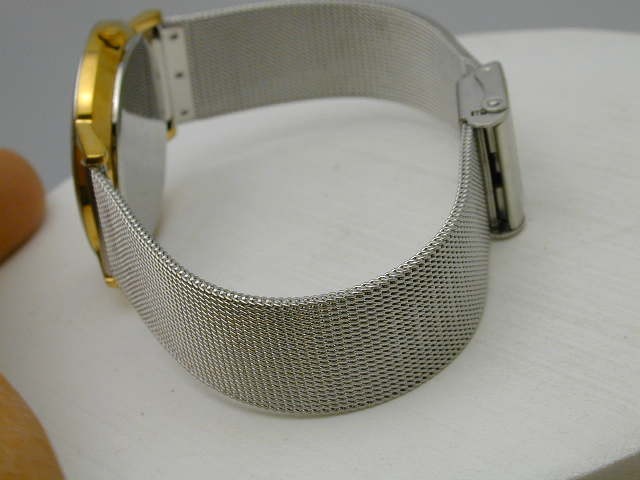 SKAGEN TWO TONE T MADE IN DENMARK RUNS GREAT, CRYSTAL FLAWED AS PICTURED.