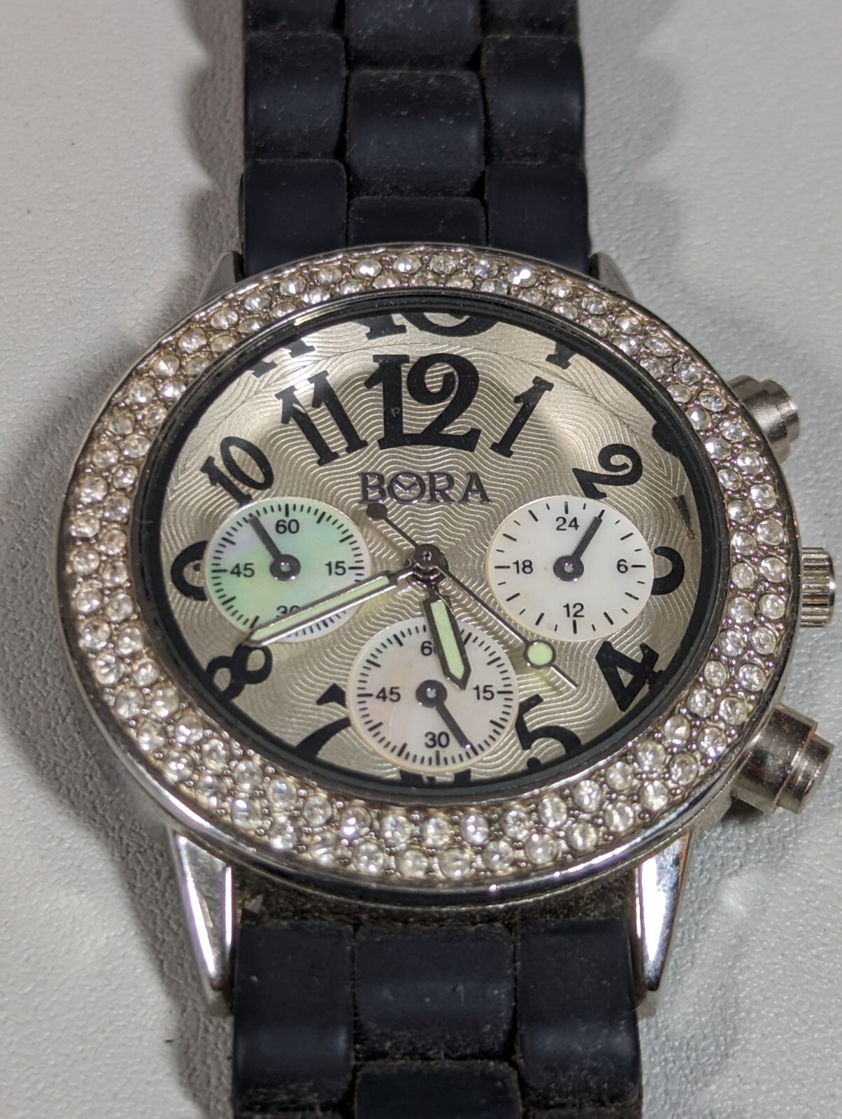 Bora Silver Tone Crystal Accent Round Case Black Silicone Band Watch
