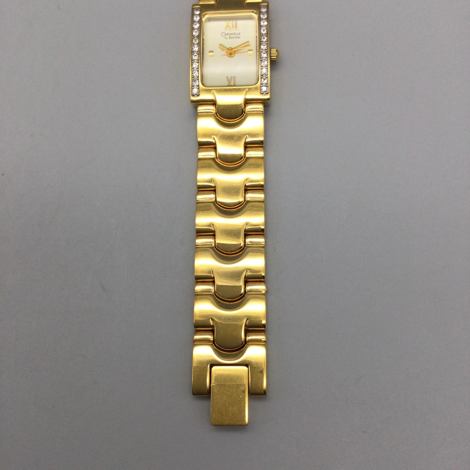 Caravelle By Bulova Womens Watch 17mm Gold Tone Tank Diamond New Battery 6″