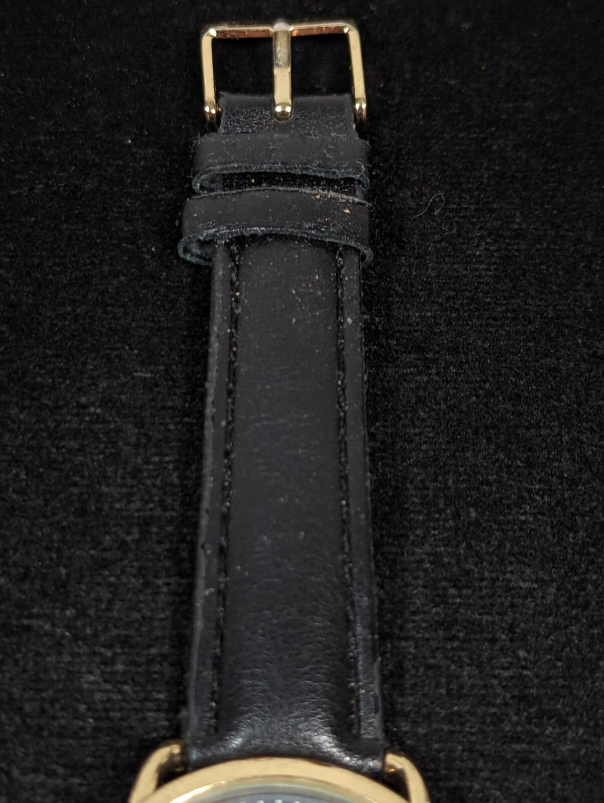 Womans Blue Gray Pearlized Dial Gold Tone Case Black Band Watch 7.5 Inch