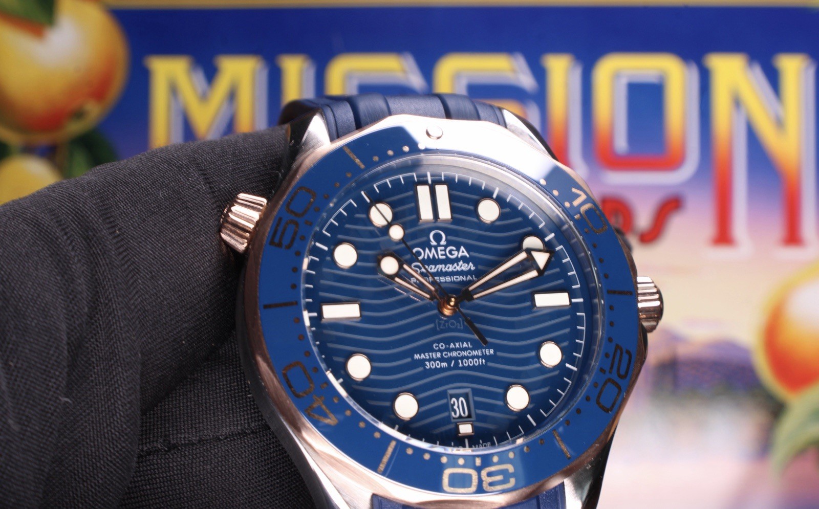 Omega Seamaster 300M Blue Wave Dial Sedna Gold Ceramic Bezel 210.22.42.20.03.002