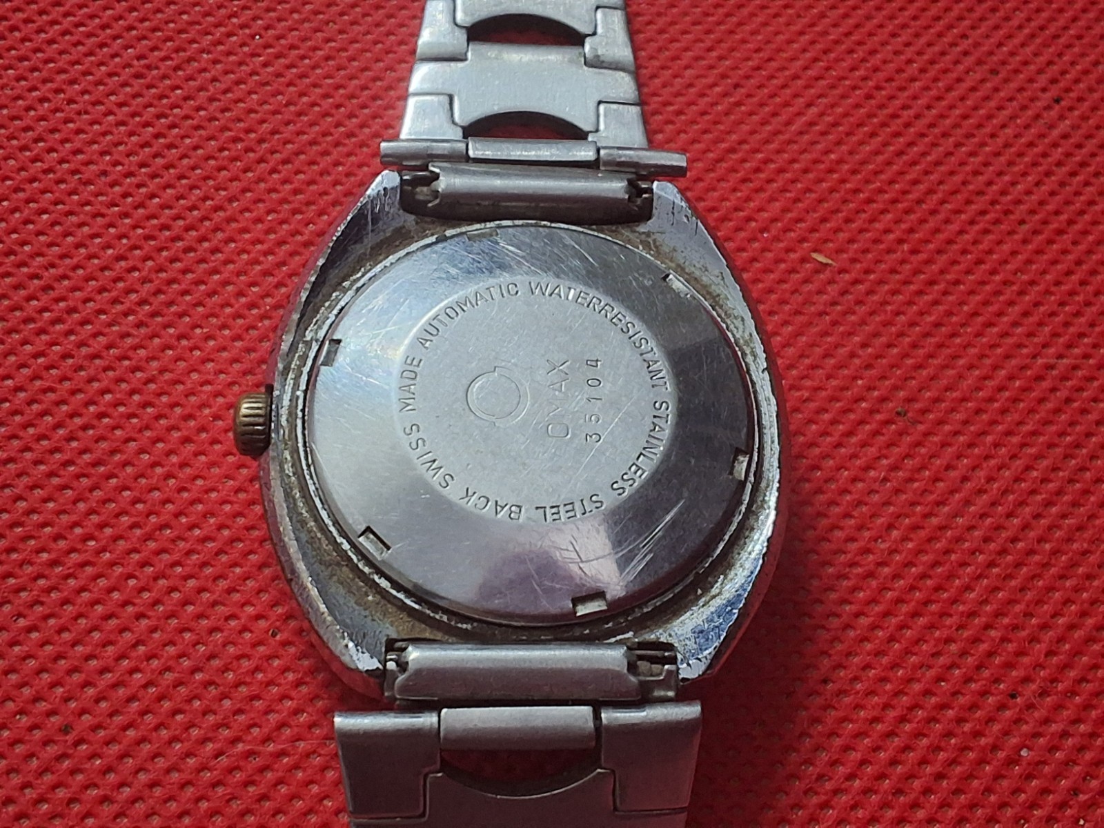 Vintage Omax Crystal 7 Automatic 25 Jewels Day/Date Wrist Watch Swiss made.