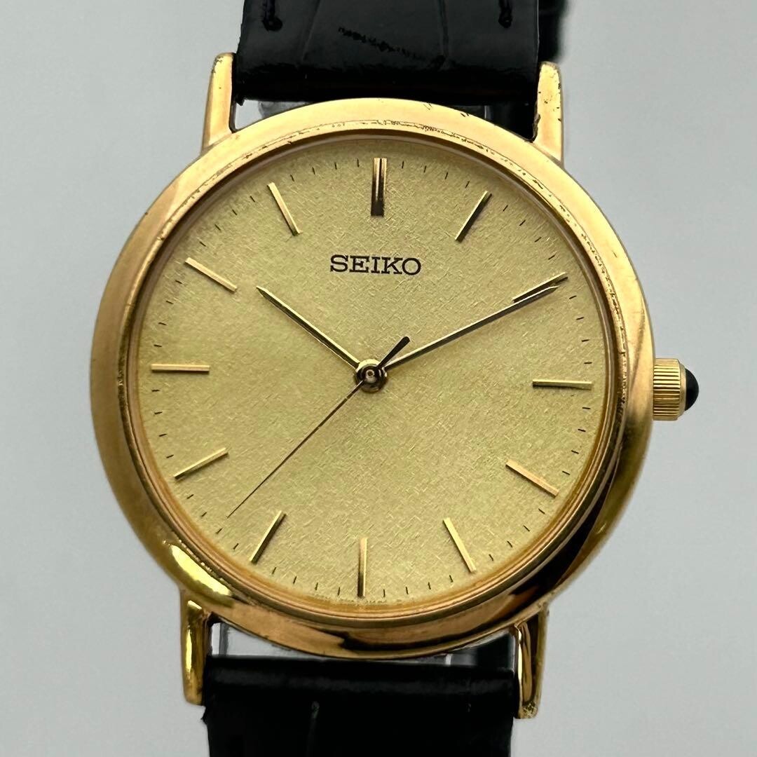SEIKO 7N01-6900 Vintage Mens Quartz Watch Gold Dial Japan Minimal 31.7mm RARE