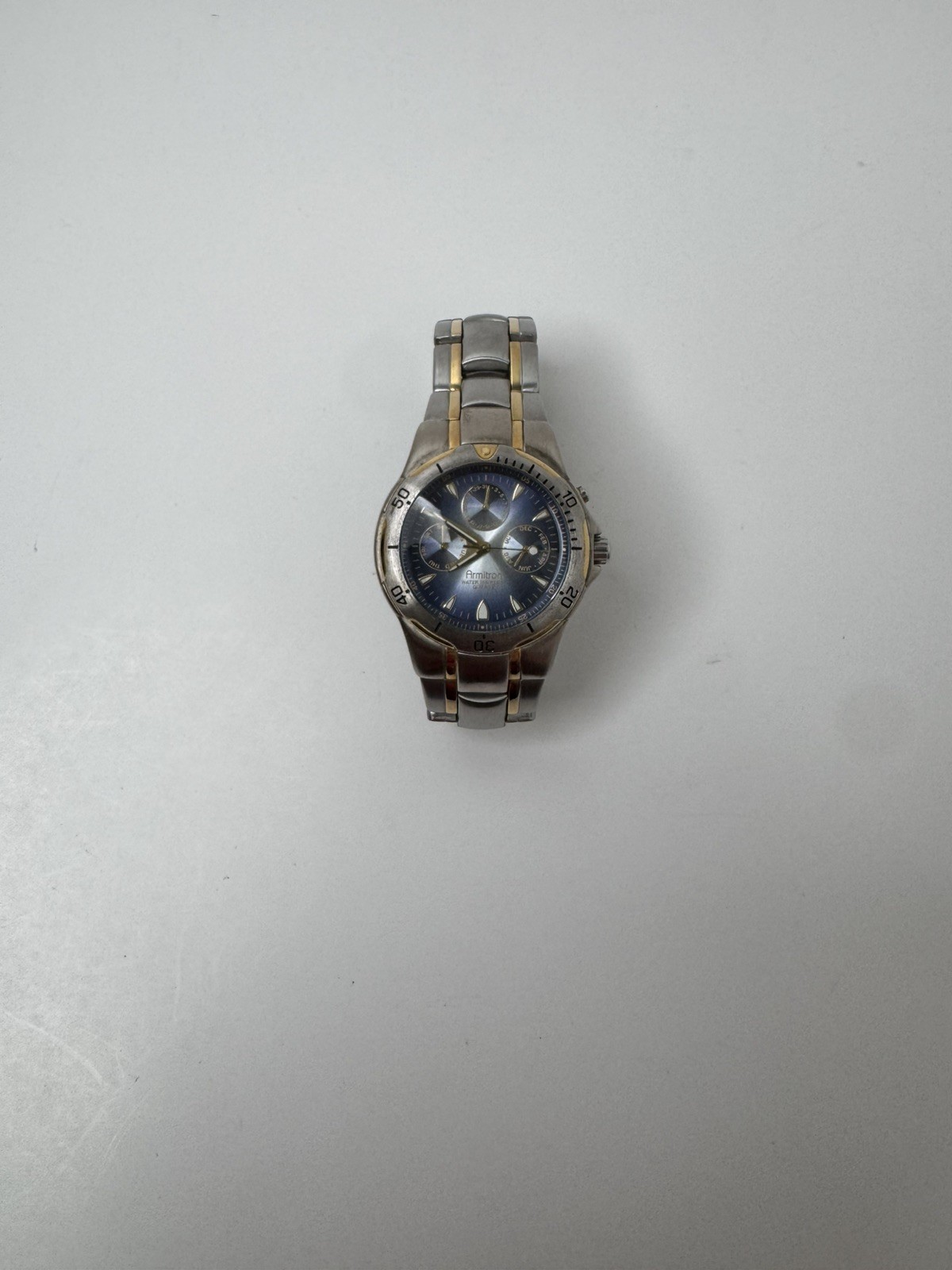 Armitron Men Watch Stainless Silver Gold Month Day Date 50m Battery Blue Quartz