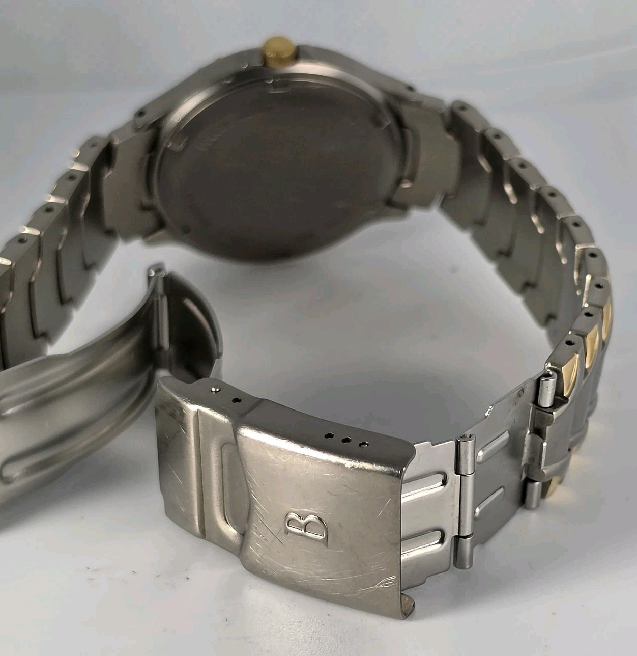 BULOVA SOLAR MILLENNIA TITANIUM SILVER GOLD TONE WATER RESISTAN 35mm GOLD DIAL