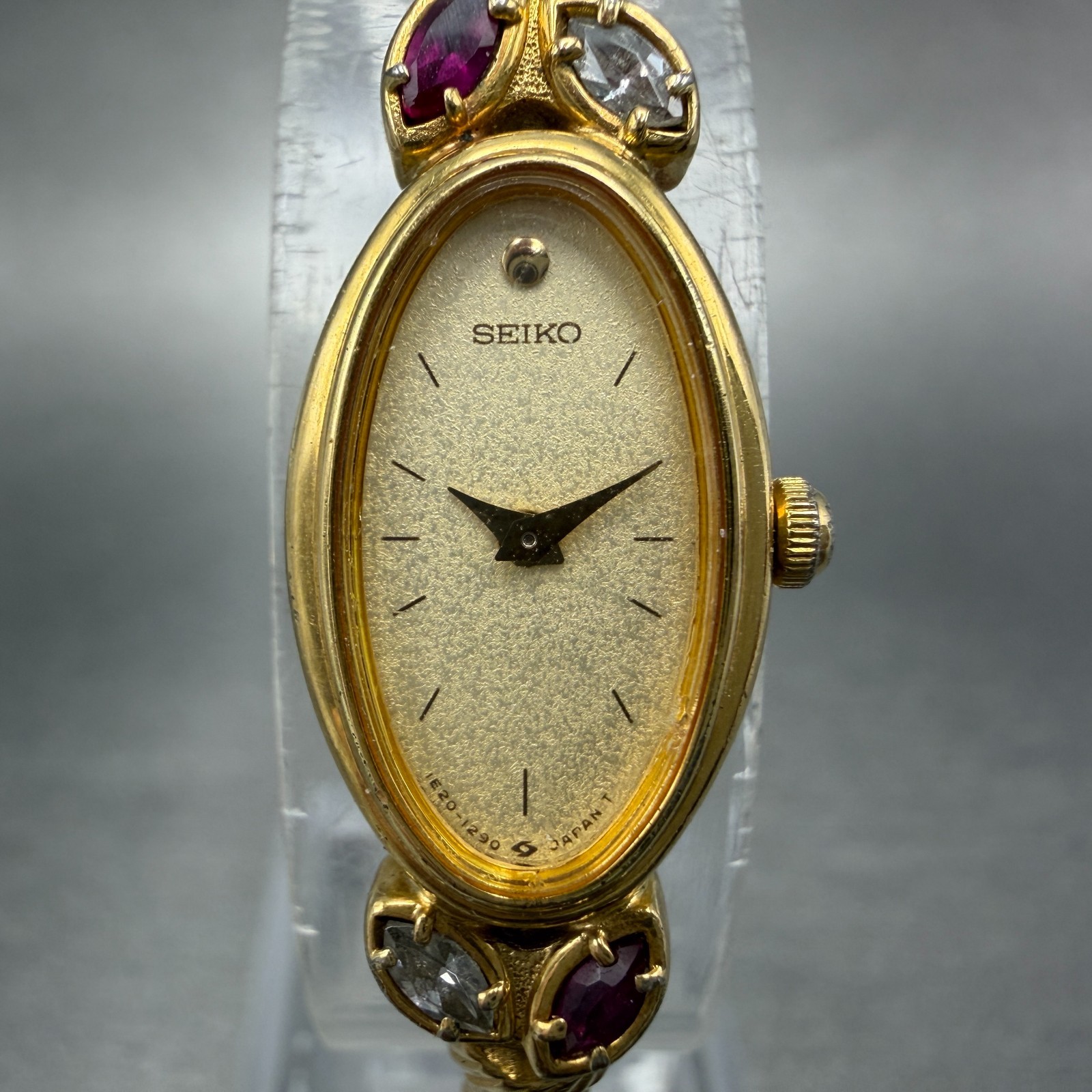 Seiko Watch Women 13mm Champagne Dial Gold Tone Oval 1E20-5760 New Battery Gems