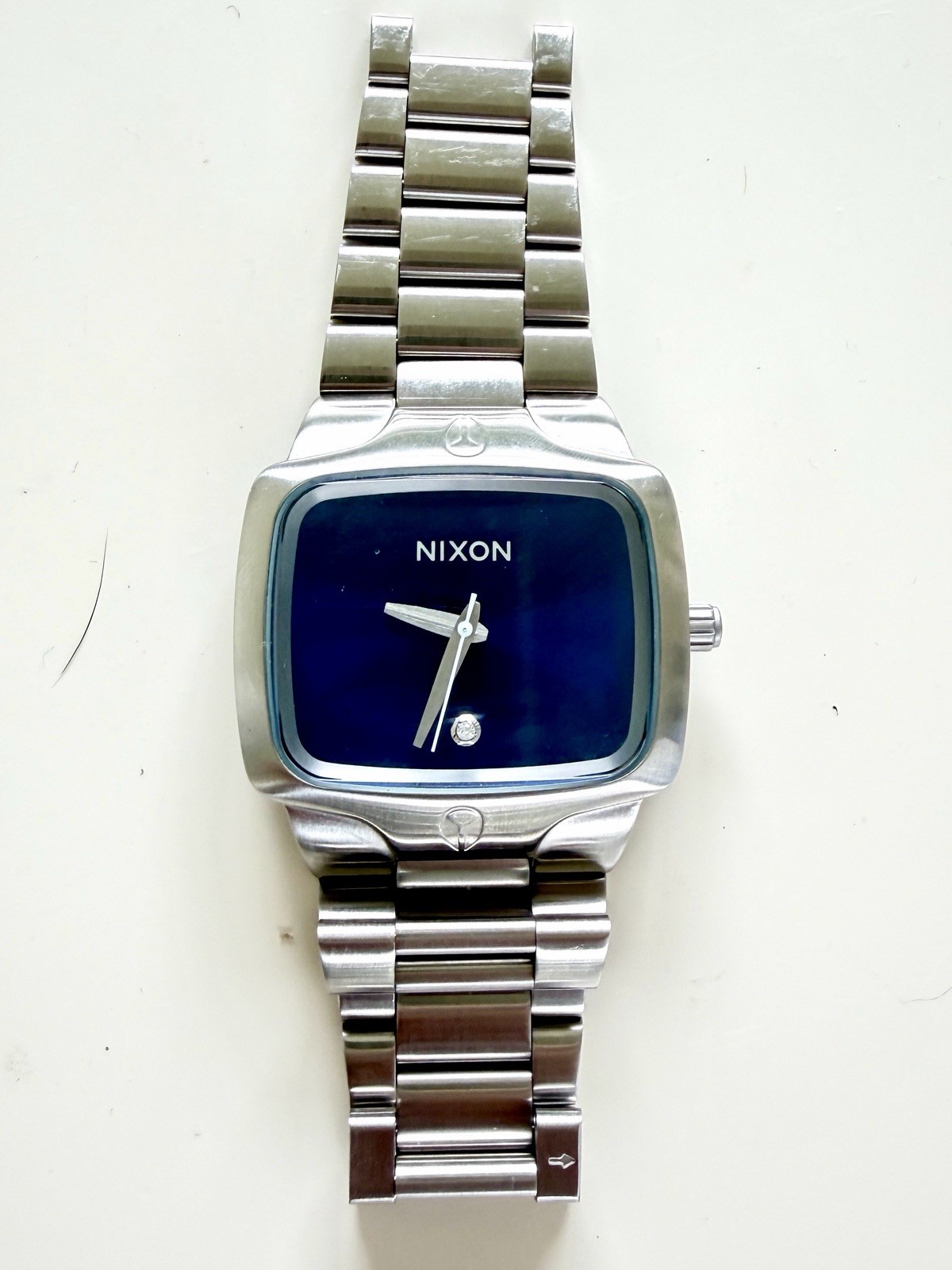 Nixon “The Player” Watch Silver Stainless Steel Blue Dial Diamond Accent