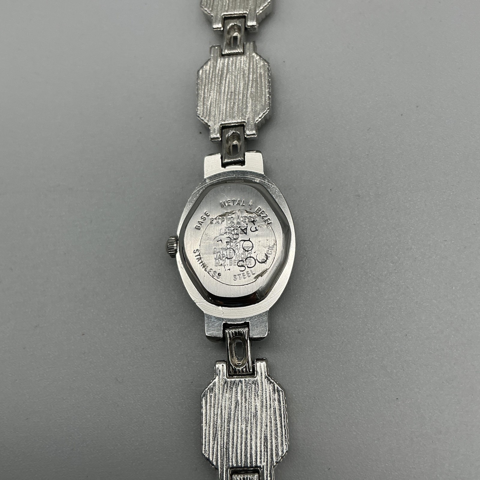 Express Womens Watch 17mm Marcasite Silver Tone Yellow Inlay New Battery 7.25″
