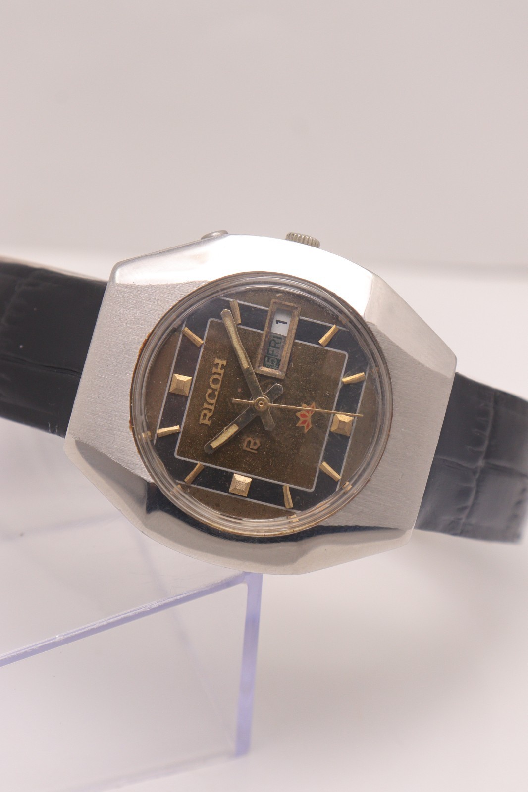 Vintage Ricoh automatic Day Date Movement R31 Japan made men’s watch.