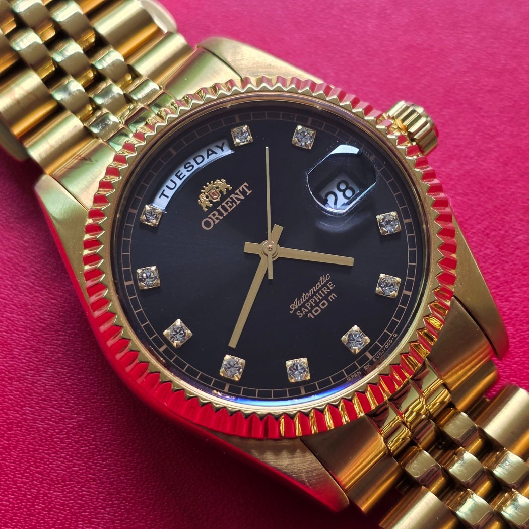 MEN’S ORIENT PRESIDENT 10 POINTS BLACK DIAL AUTOMATIC DAY DATE GOLD/SS