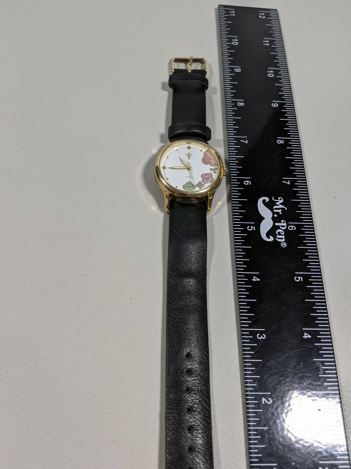 Green Pink Purple Round Gold Tone Case 34 mm Black Faux Leather Band Watch 9 In.