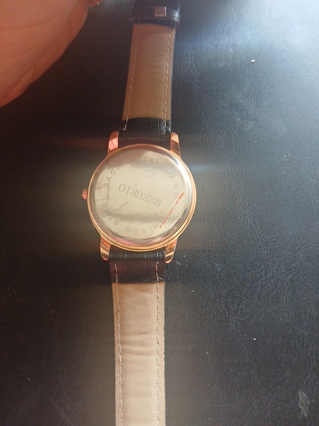 Mreurio White Dial Round Gold Tone Case Black Leather Band Watch