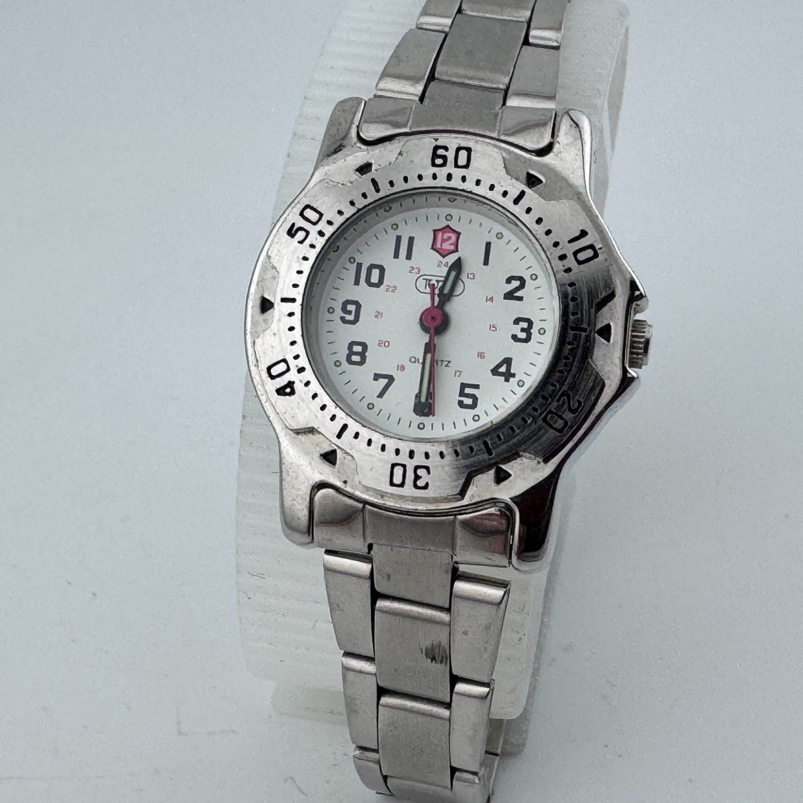 TUAI Japan Quartz Watch Women Silver Military Dial Fixed Bezel New Battery 7.25″
