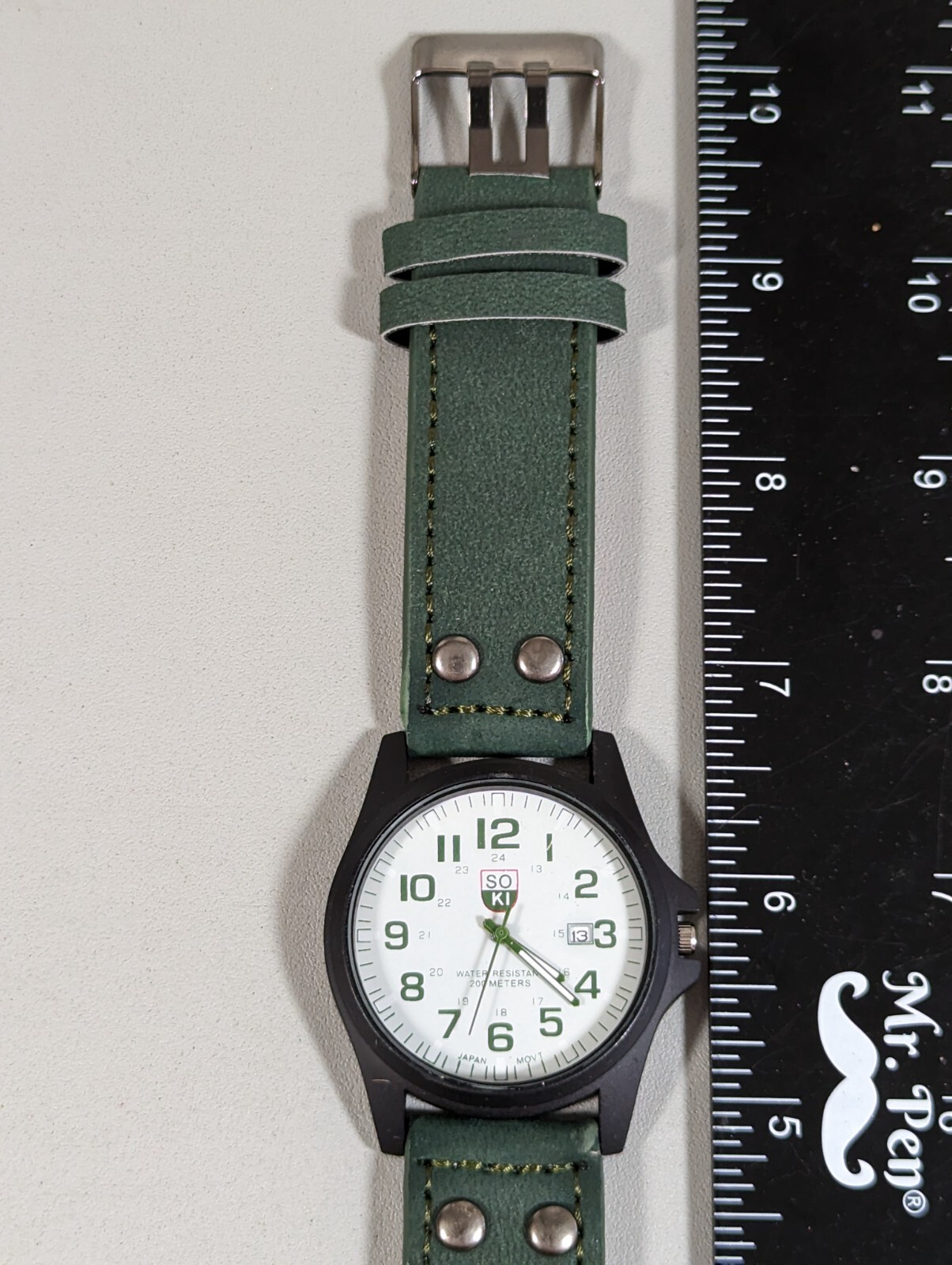 Soki White Dial Date Indicator Black Round Case Green Faux Leather Band Watch