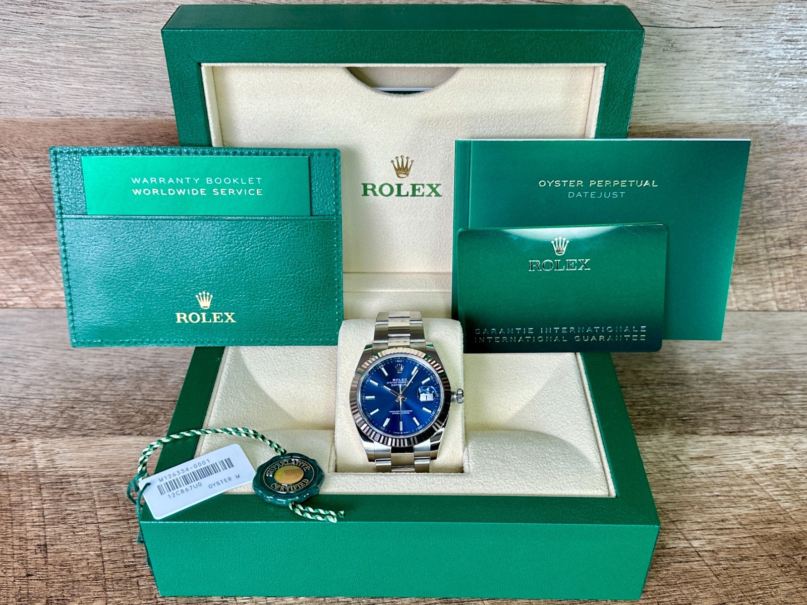 Rolex Datejust 41 Ref. 126334 Blue Dial with White Gold Fluted Bezel NEVER WORN!