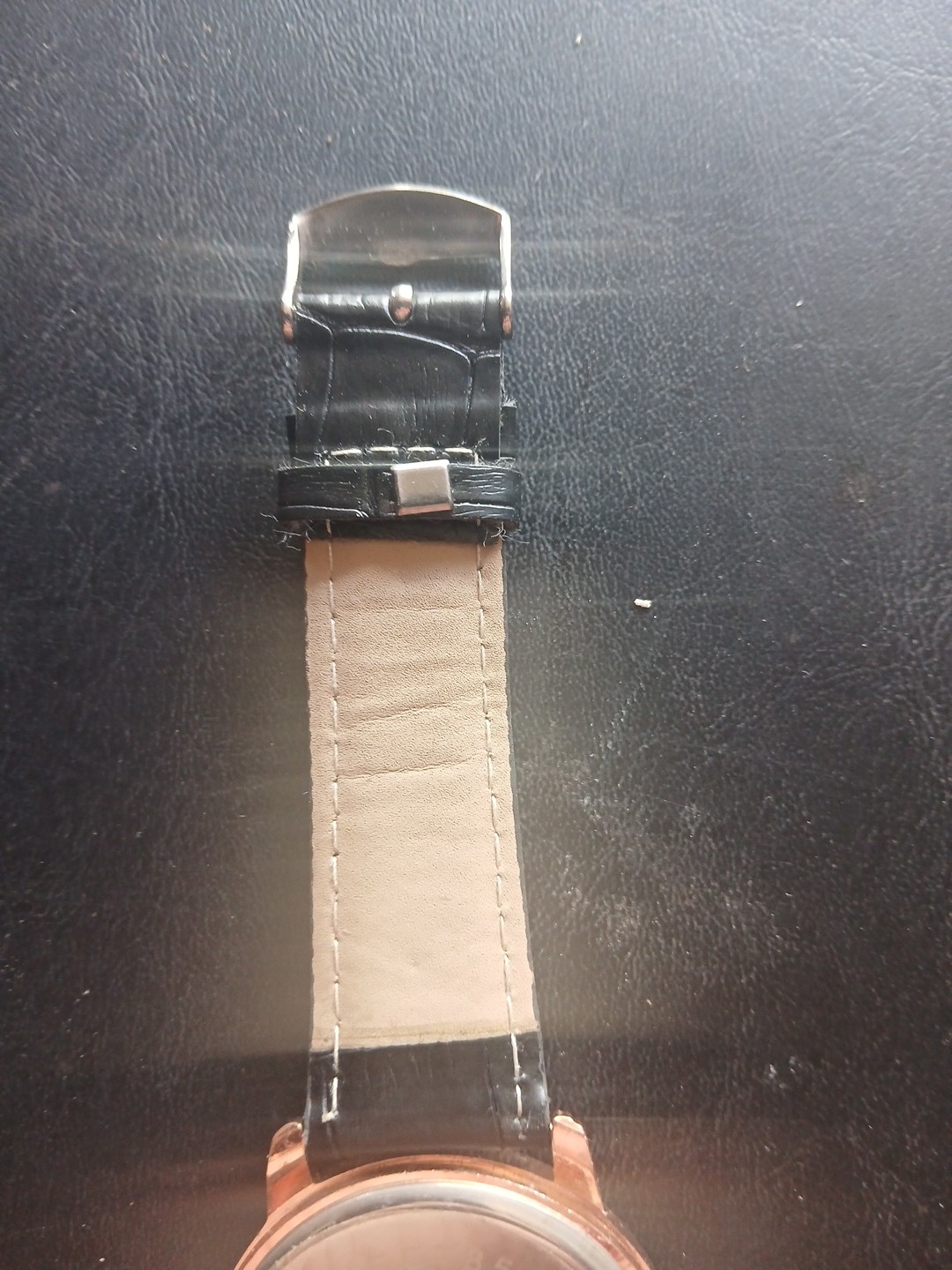 Mreurio White Dial Round Gold Tone Case Black Leather Band Watch