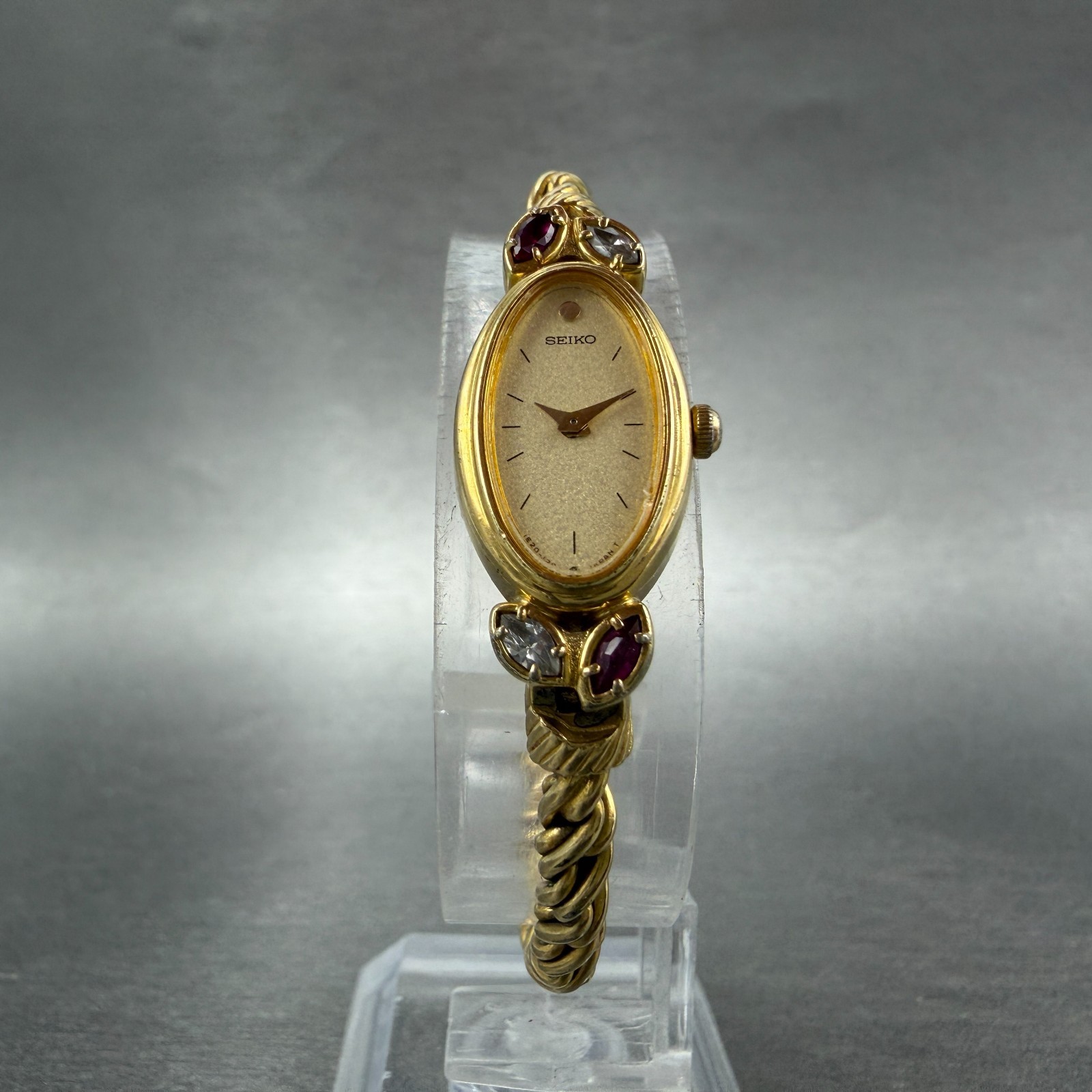 Seiko Watch Women 13mm Champagne Dial Gold Tone Oval 1E20-5760 New Battery Gems
