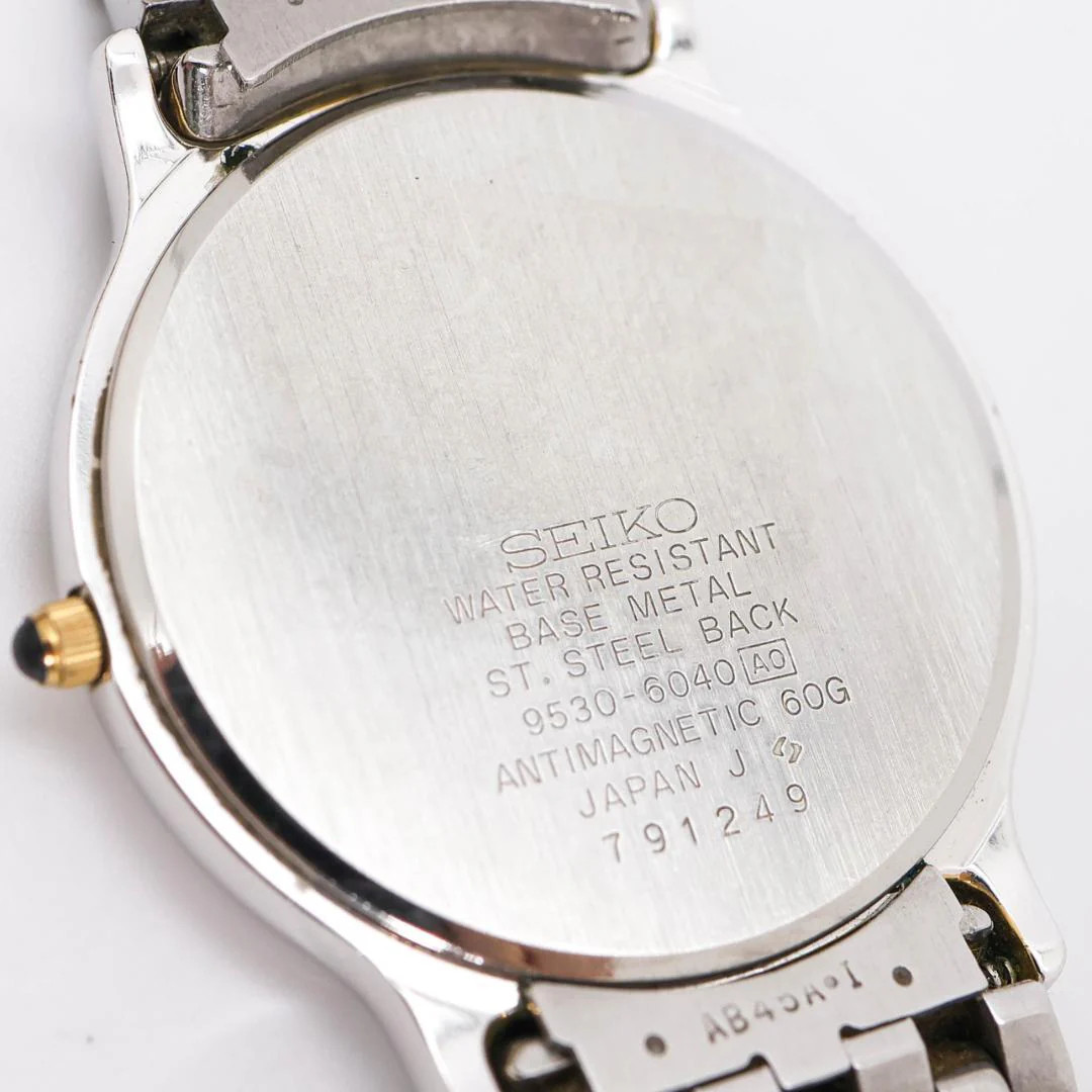 SEIKO Dolce Quartz Two-Tone White Dial Roman Numerals 35x31mm