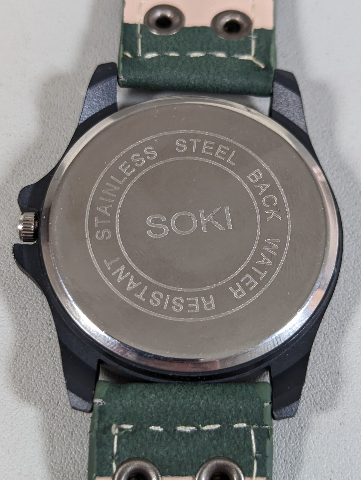 Soki White Dial Date Indicator Black Round Case Green Faux Leather Band Watch