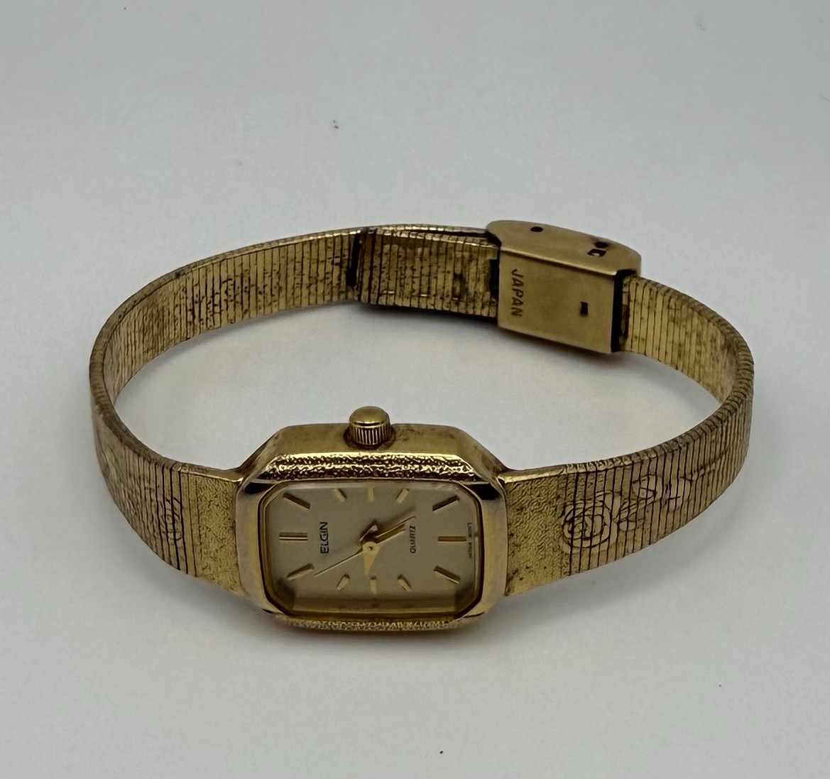 Womens Elgin Quartz Gold Tone Rectangle Case Metal Bangle Analog Floral Watch