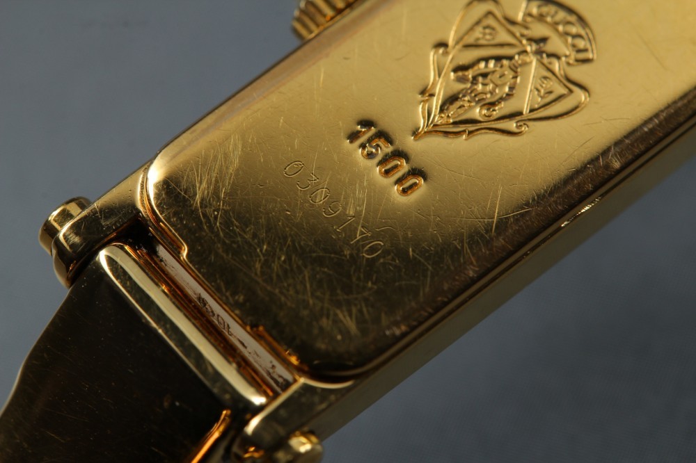 GUCCI 1500 Black Dial Rectangular Gold Bangle Quartz 12mm Ladies Watch