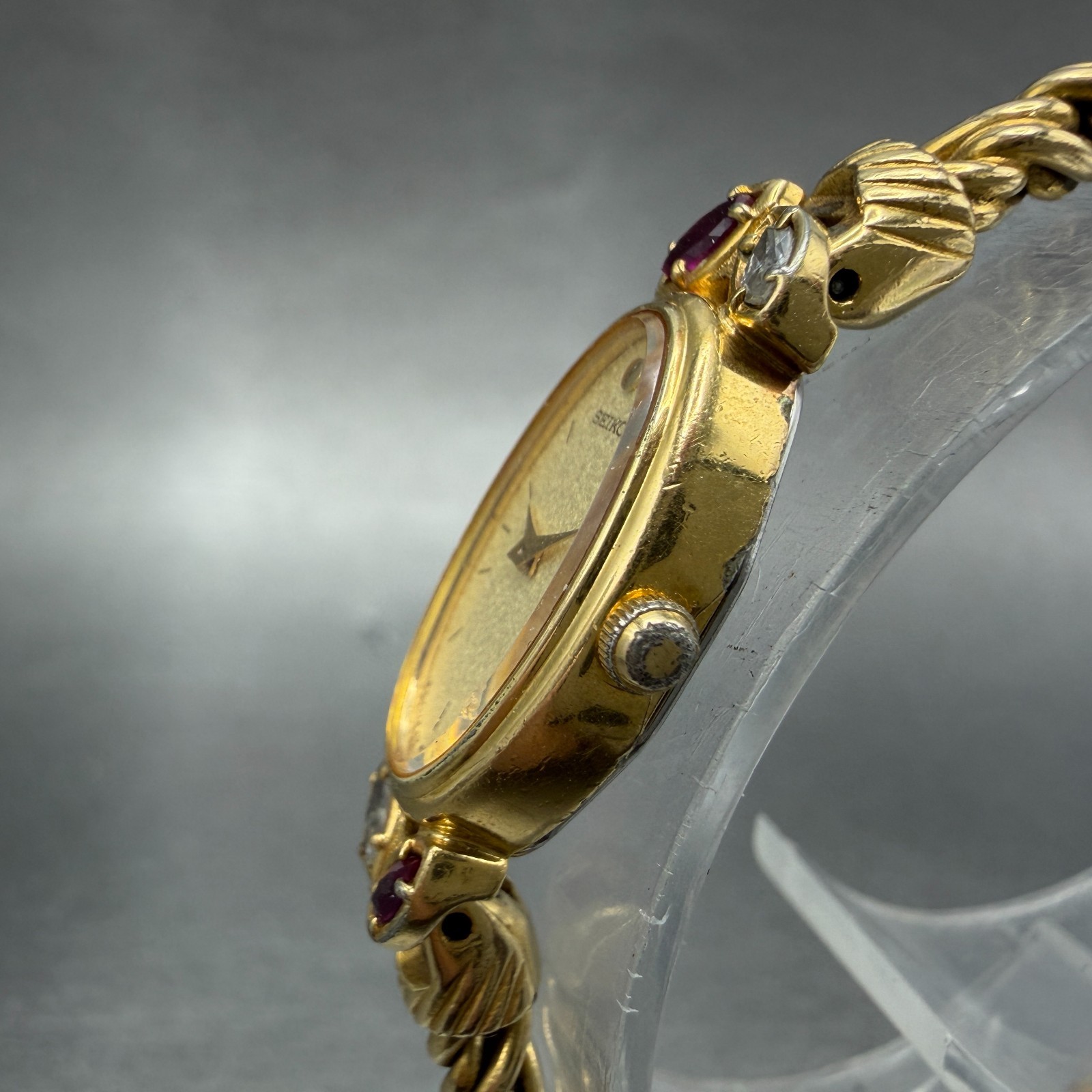 Seiko Watch Women 13mm Champagne Dial Gold Tone Oval 1E20-5760 New Battery Gems