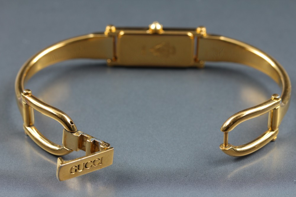 GUCCI 1500 Black Dial Rectangular Gold Bangle Quartz 12mm Ladies Watch