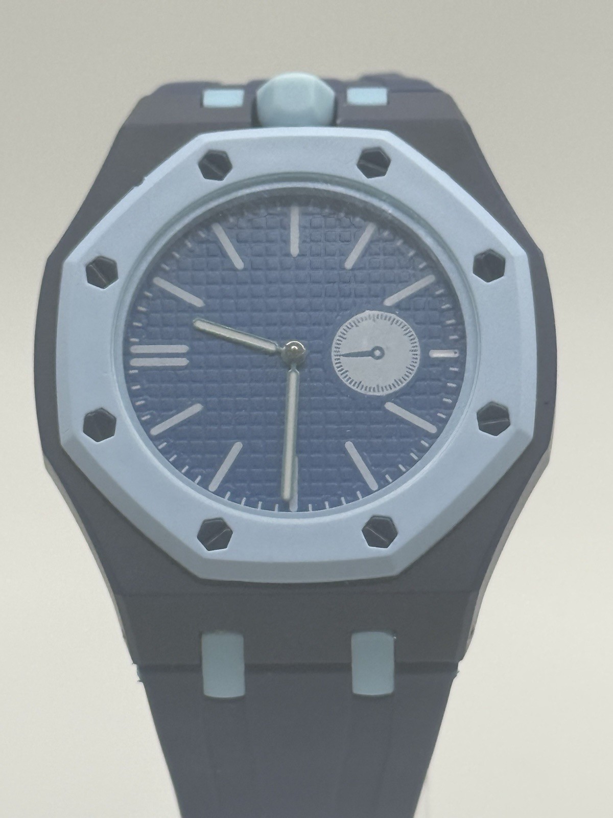 Analog Octagon Wristwatch Blue Dial Gray Plastic Case Fixed Bezel Black Rubber